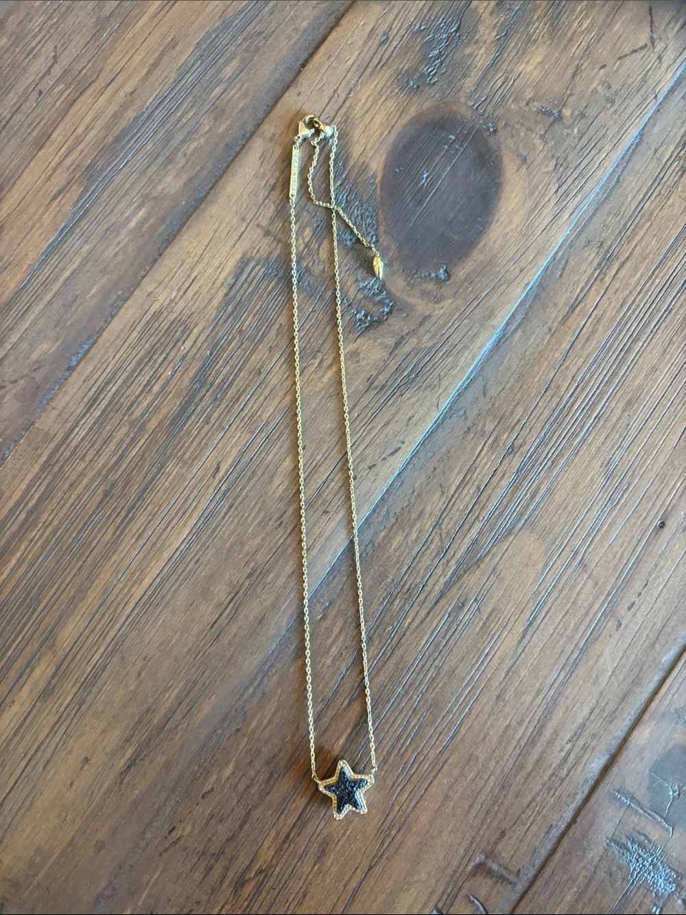Kendra Scott Gold Star Necklace with Black Center